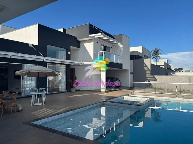 Casa com 1400m² 4 quartos e 5 banheiros, à venda ou para alugar, no bairro Condomínio Aldeias do Lago (Melo Viana) em Esmeraldas