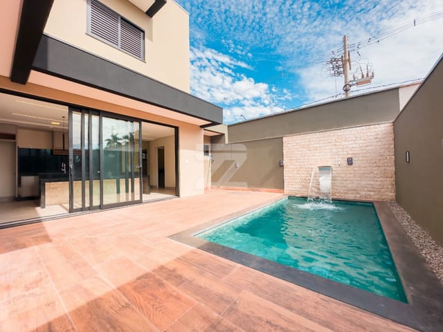 Foto do Casa - Casa Venda 230m² Porto Seguro (Dourados) 4 Suítes 1 Lavabo Cozinha Gourmet integrada Piscina 2 Vagas de Garagem | Ezzato Imóveis