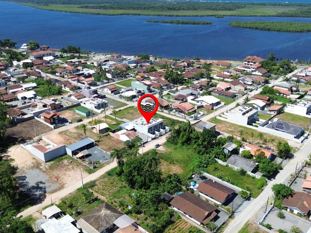 Foto do Casa - Geminado Térreo N°3, Aproximadamente 250 metros da Lagoa Bairro Costeira, Balneário Barra do Sul, SC | North Center