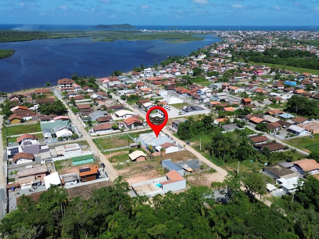 Foto do Casa - Geminado Térreo N°3, Aproximadamente 250 metros da Lagoa Bairro Costeira, Balneário Barra do Sul, SC | North Center