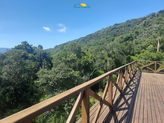 Foto do Casa - Linda casa com exuberante vista para o mar e Ilha do Campeche, a 600 metros da Lagoa do Peri e 1,2 km da Praia do Morro das Pedras - Florianópolis/SC | Costão Sul Imóveis