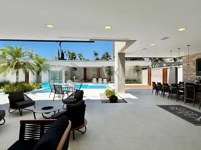 Casa com 1050m² 7 quartos e 8 banheiros, à venda ou para alugar, no bairro Acapulco em Guarujá