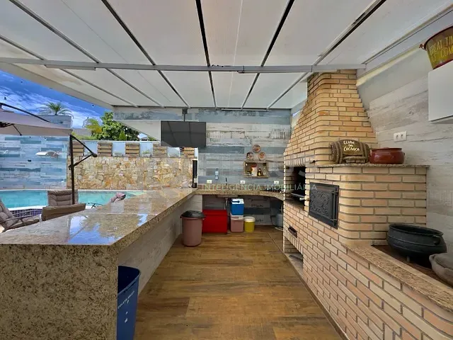 Casa com 525m² 4 quartos e 6 banheiros, à venda ou para alugar, no bairro Acapulco em Guarujá