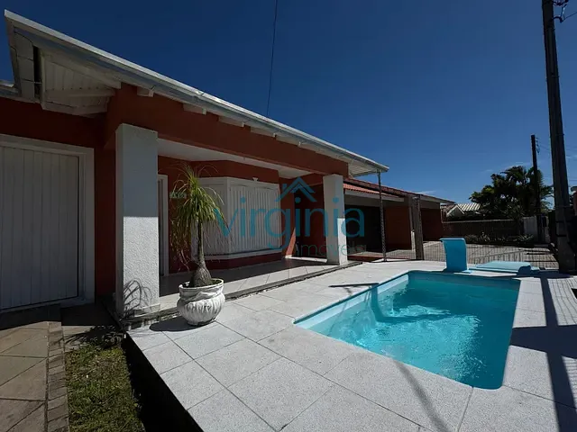 Casa 4 quartos e 3 banheiros, à venda, no bairro Centro em Xangri-Lá