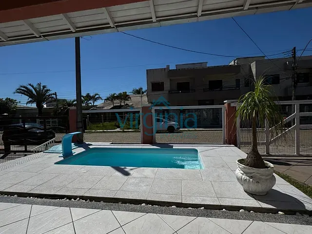 Casa 4 quartos e 3 banheiros, à venda, no bairro Centro em Xangri-Lá