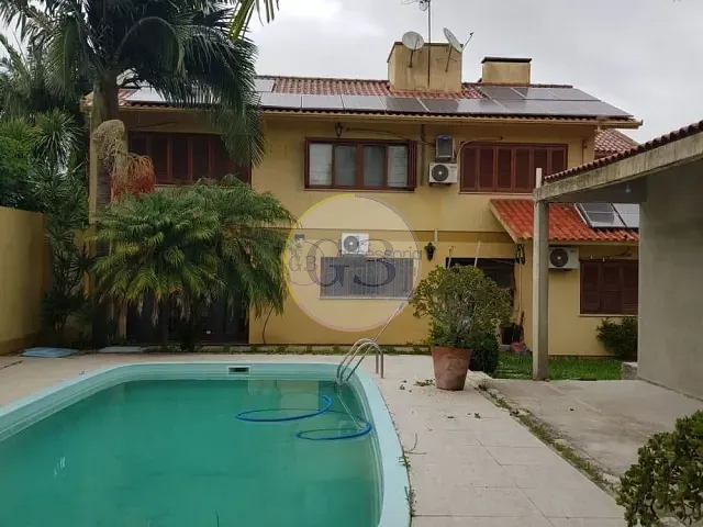 Casa 4 quartos e 3 banheiros, à venda, no bairro Areal em Pelotas