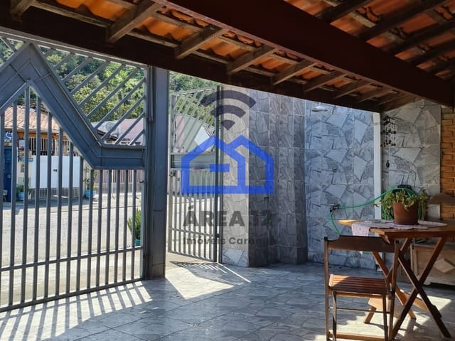 Foto do Casa - Casa à venda com 3 dormitórios, sala, cozinha, banheiro e duas vagas na garagem, no bairro Caputera em Caraguatatuba, localizado na região central | Área 12 imóveis