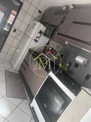 Casa à venda com 3 quartos, 106m² - Foto 1