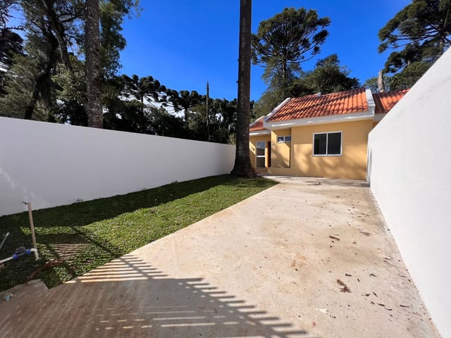 Foto do Casa - Casa contendo 3 dormitórios e terreno medindo 150m², à venda no bairro Palmital em Colombo, PR | K9 Imóveis