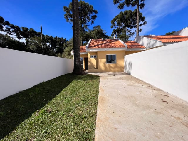 Foto do Casa - Casa contendo 3 dormitórios e terreno medindo 150m², à venda no bairro Palmital em Colombo, PR | K9 Imóveis