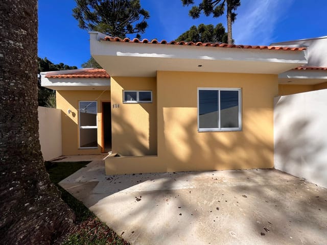Foto do Casa - Casa contendo 3 dormitórios e terreno medindo 150m², à venda no bairro Palmital em Colombo, PR | K9 Imóveis