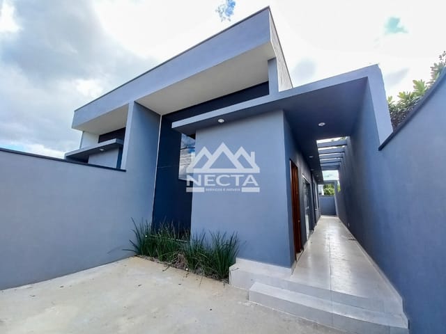 Foto do Casa - Casa à Venda, 2 dormitórios, 1 vaga, 65m², Golfinhos, Caraguatatuba, SP | Necta Serviços Imobiliários Ltda