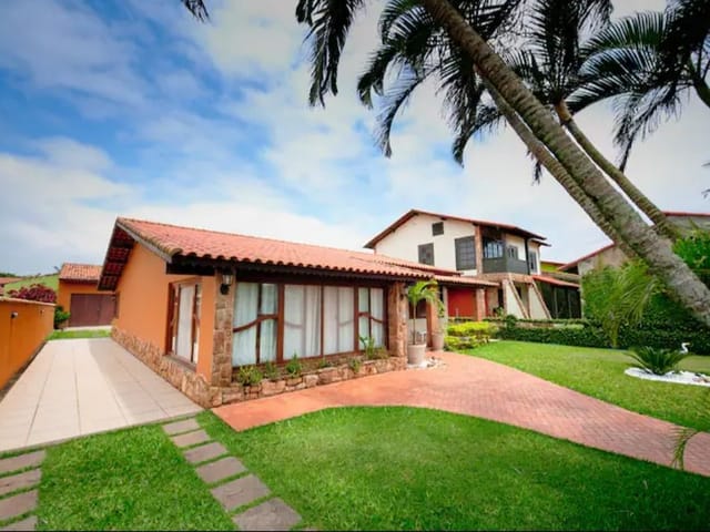 Foto do Casa - Casa com 3 dormitórios, piscina e sauna à venda em Unamar - Cabo Frio/RJ | Grupo Casa Imóveis