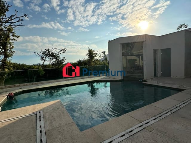 Casa 4 quartos e 5 banheiros, à venda ou para alugar, no bairro Barra da Tijuca em Rio de Janeiro