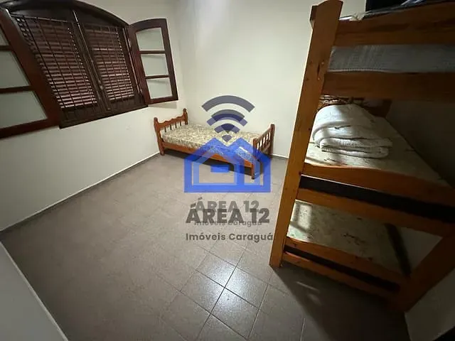 Casa com 600m² 3 quartos e 2 banheiros, à venda, no bairro Martim de Sá em Caraguatatuba