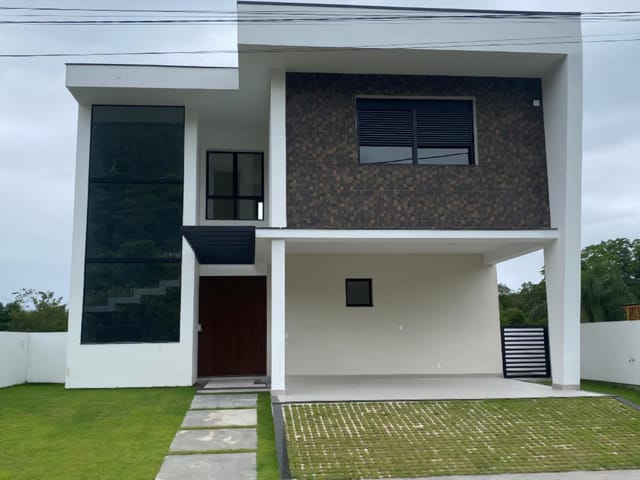 Foto do Casa - Casa de dois pavimentos com três suítes, financiável, em condomínio fechado no Vilaporé II - Canajurê - Florianópolis/SC | Costão Sul Imóveis