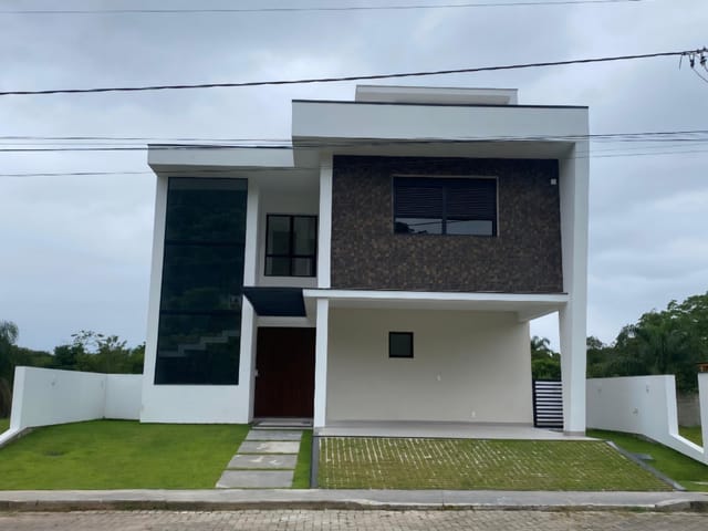 Foto do Casa - Casa de dois pavimentos com três suítes, financiável, em condomínio fechado no Vilaporé II - Canajurê - Florianópolis/SC | Costão Sul Imóveis