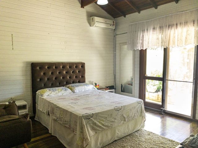 Foto do Casa - Casa com 3 dormitórios à venda, por R$ 400.000 no Laranjal em Pelotas/RS | UP Imóveis
