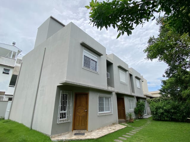 Foto do Casa - Casa de alvenaria com 2 pavimentos, 2 quartos (demi-suíte) ,geminada, financiável, sem taxa de condomínio no Campeche - Florianópolis/SC. | Costão Sul Imóveis