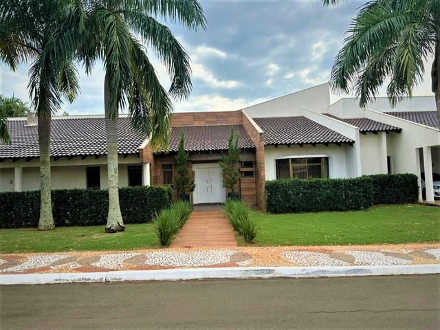 Foto do Casa - Casa de alto padrão térrea no Condomínio Tucanos, 600 m², 5 quartos, 3 suítes, 6 salas, área gourmet com churrasqueira e fogão a lenha, piscina aquecida. | Grupo Mitral Imóveis