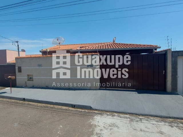 Foto do Casa - Casa residencial para Venda
Jardim Ouro Verde, Guaxupé
2 dormitórios sendo 1 suíte, 1 sala, Cozinha, Lavanderia, Churrasqueira, Canil, Garagem para 2 carros coberto;
100,00 m² construída, 128,00 m² terreno | Guaxupé Imóveis Ltda