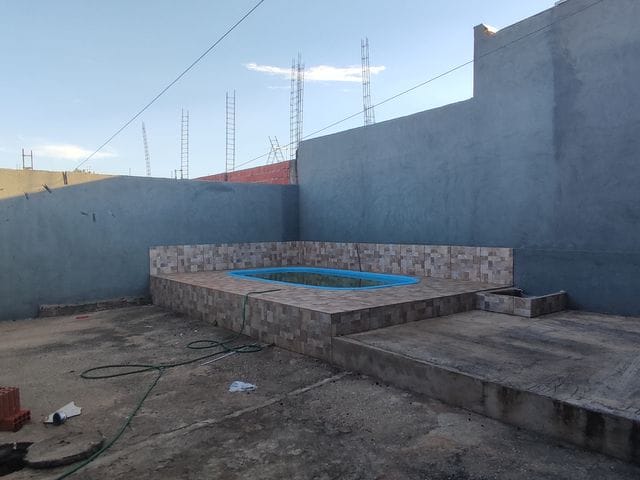 Foto do Casa - Casa térrea com PISCINA à venda no Residencial Buritis-Cuiabá-MT- ótima localização, quintal e área frontal grande, Financiável | Lyah Jaudy Imóveis