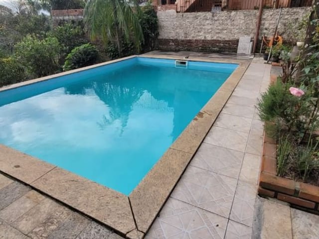 Foto do Casa - Casa com 2 dormitórios para alugar, Bairro Ouro Branco - Novo Hamburgo/RS | Imobiliária Weber RS Ltda