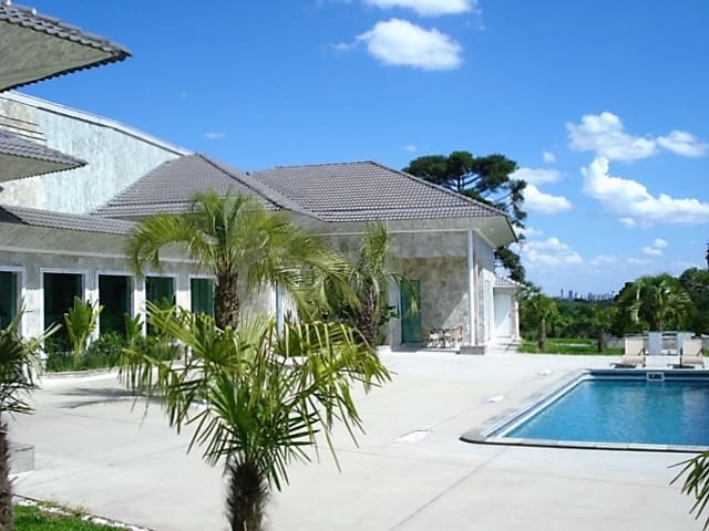 Foto do Casa - Parque Tingui, 1.090,30m², 4 suítes, quadra de squash, terreno 13.877,50m², 10 vagas estacionamento, piscina, à venda, Curitiba, PR | Imobiliária GreenVille