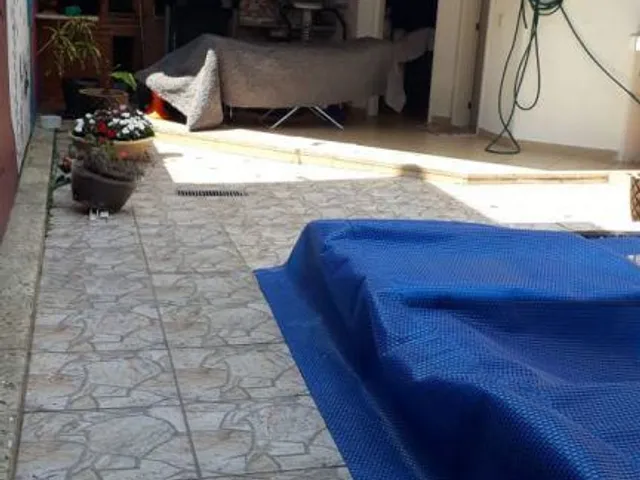 Casa com 310m², à venda ou para alugar, no bairro Vila Bastos em Santo André