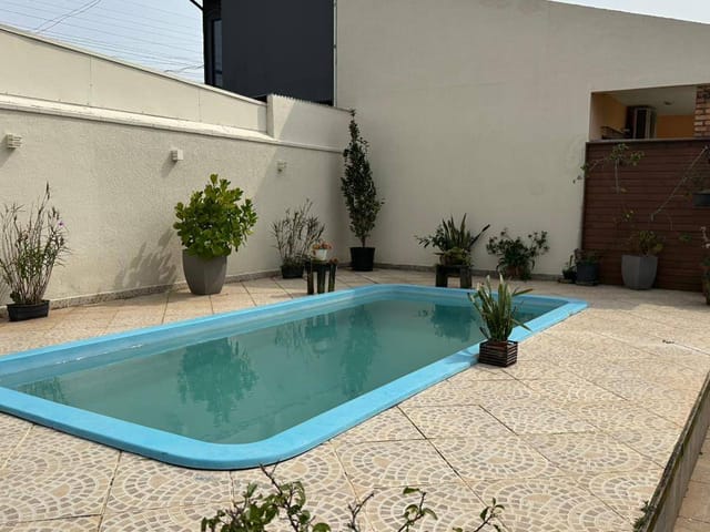 Foto do Casa - Casa à VENDA com 260m² de 3 Dormitórios com piscina no Campeche Central – Florianópolis/SC | Costão Sul Imóveis