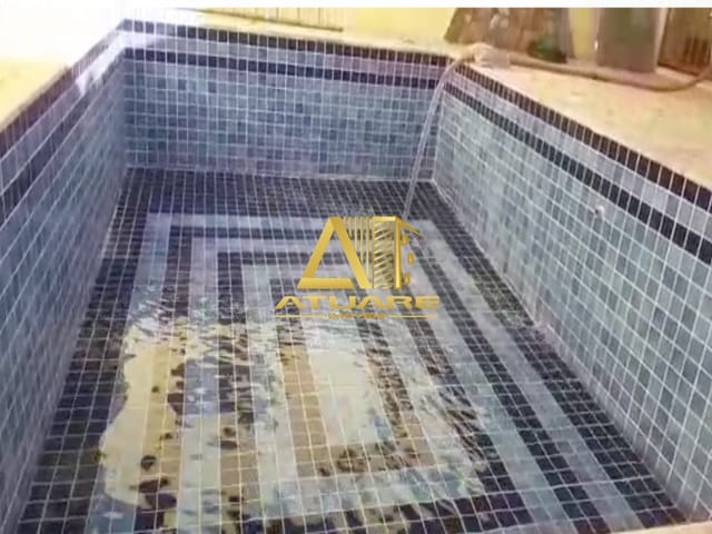 Foto do Casa - Ampla casa no bairro São Carlos, com 03 dormitórios sendo com 01 suíte, grande quinta, churrasqueira e linda piscina | Atuare Imóveis