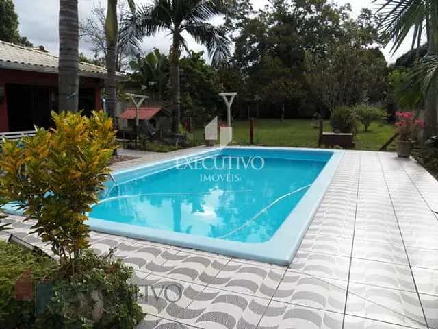 Casa com 1100m² 4 quartos e 5 banheiros, à venda, no bairro Centro em Arroio Do Meio