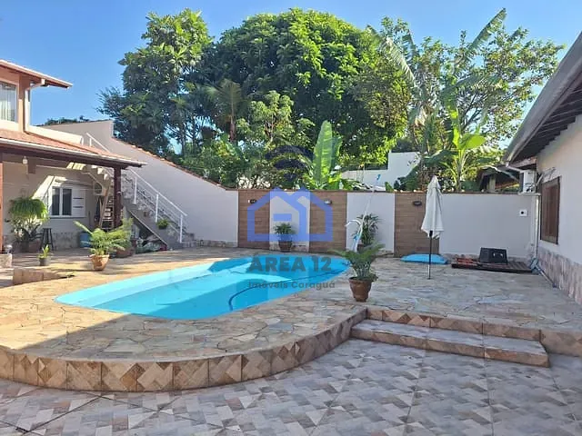 Casa com 500m² 4 quartos e 2 banheiros, à venda, no bairro Porto Novo em Caraguatatuba