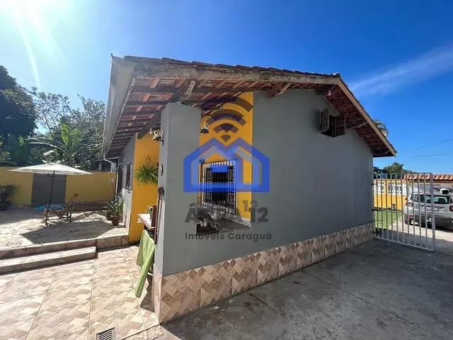 Casa com 500m² 4 quartos e 2 banheiros, à venda, no bairro Porto Novo em Caraguatatuba