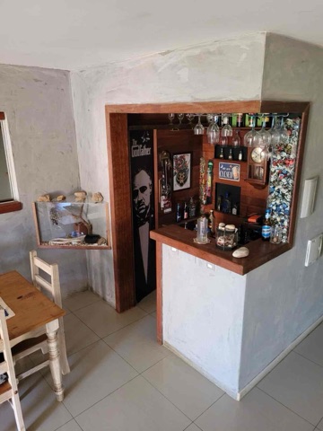 Foto do Casa - À VENDA: Casa Mobiliada no Campeche com Piscina, Charme Rústico e Conforto Moderno, no Campeche em Florianópolis. | Costão Sul Imóveis