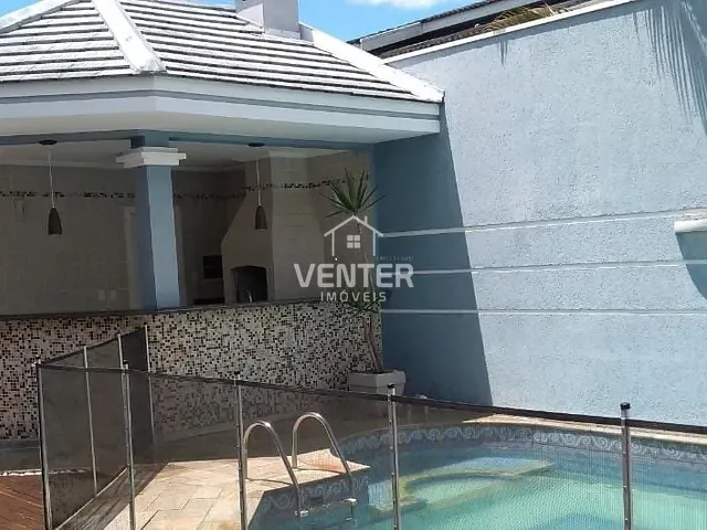 Casa com 420m² 4 quartos e 7 banheiros, à venda, no bairro Residencial Portal da Mantiqueira em Taubaté