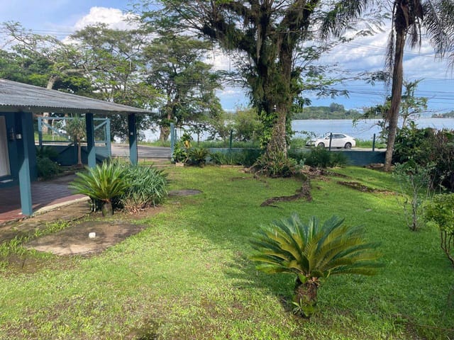 Foto do Casa - Casa de 90 m² em terreno de 10.400m² com vista para o mar e Escritura Pública na Freguesia - Ribeirão da Ilha - Florianópolis/SC | Costão Sul Imóveis