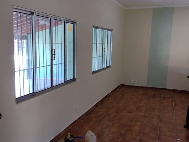 Foto do Casa - CASA COM 3 DORMITÓRIOS E 2 SUÍTES À VENDA, JARDIM IMPERADOR, PRAIA GRANDE, SP | Volpi Negócios Imobiliários