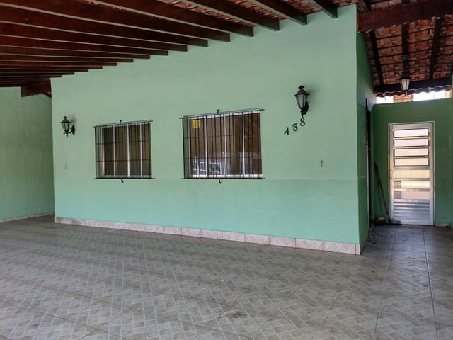 Foto do Casa - CASA COM 3 DORMITÓRIOS E 2 SUÍTES À VENDA, JARDIM IMPERADOR, PRAIA GRANDE, SP | Volpi Negócios Imobiliários