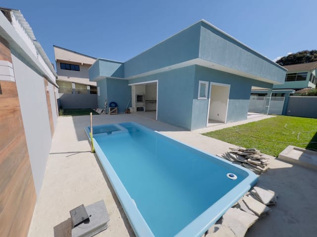 Foto do Casa - Casa Nova com 3 Quartos, Suíte, Piscina e Excelente Localização Próxima a Comércio, Centro, Guapimirim, RJ | Sansil Imóveis