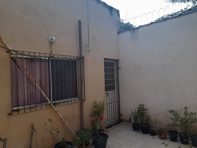 Foto do Casa - Casa com 3 dormitórios à venda, 69 m² por R$ 240.000,00 - Itaguaçu - Aparecida/SP | Imobiliária Domos