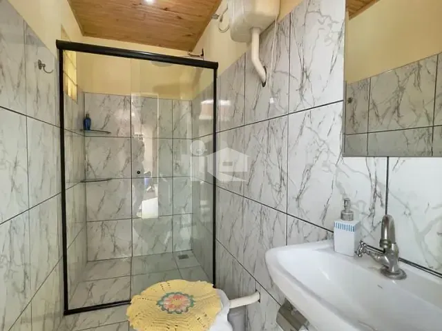 Casa com 250m² 3 quartos e 2 banheiros, à venda, no bairro Conjunto Habitacional Santiago em Rolândia