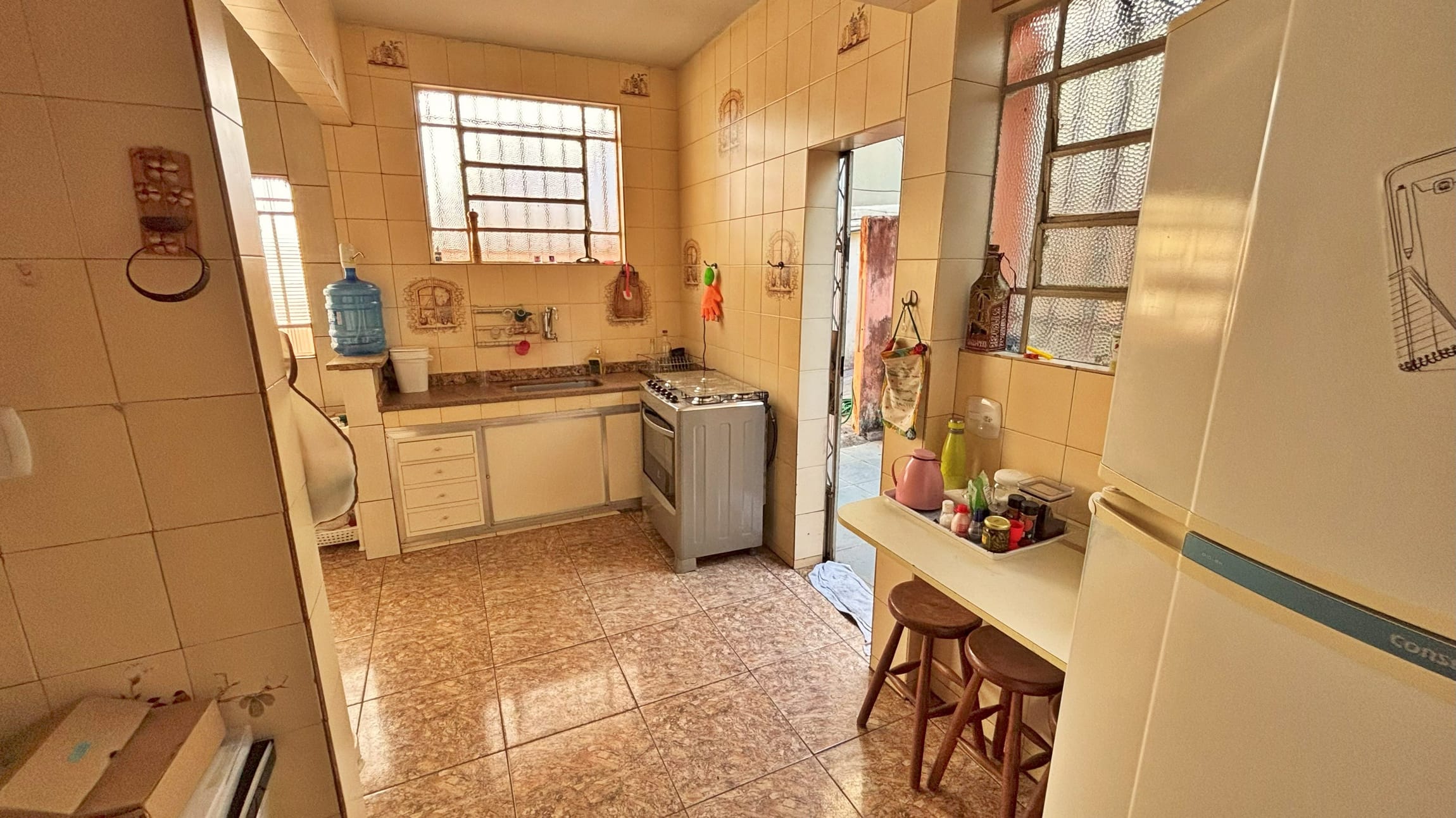 Casa à venda no bairro Padre Eustáquio, Belo Horizonte – 3 quartos, 2 vagas e 2 barracões nos fundos