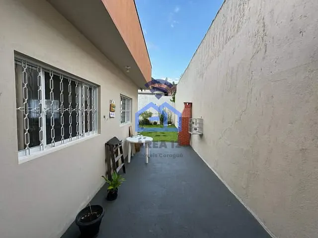 Casa com 300m² 3 quartos e 2 banheiros, à venda, no bairro Martim de Sá em Caraguatatuba