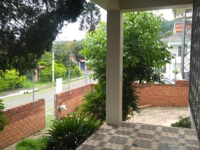 Foto do Casa - Casa com 3 dormitórios para alugar por R$ 2.400,00/mês - Vila Nova - Novo Hamburgo/RS | Imobiliária Weber RS Ltda