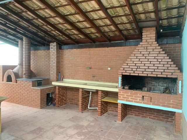 Foto do Casa - Casa para locação no bairro do Indaiá em Caraguatatuba, SP - 3 dormitórios, sendo 1 suíte, vaga para 5 veículos | Área 12 imóveis