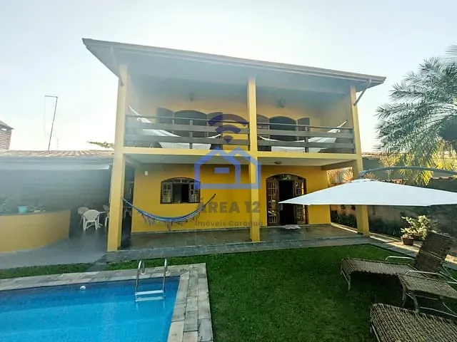 Sobrado com 450m² 4 quartos e 4 banheiros, à venda, no bairro Aruan em Caraguatatuba