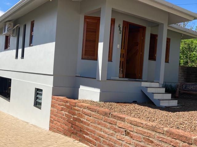 Foto do Casa - Casa com 2 dormitórios, garagem para 2 veículos, cercada e murada, à venda no Bairro Aimoré na cidade de Arroio do Meio/RS | Executivo Imóveis