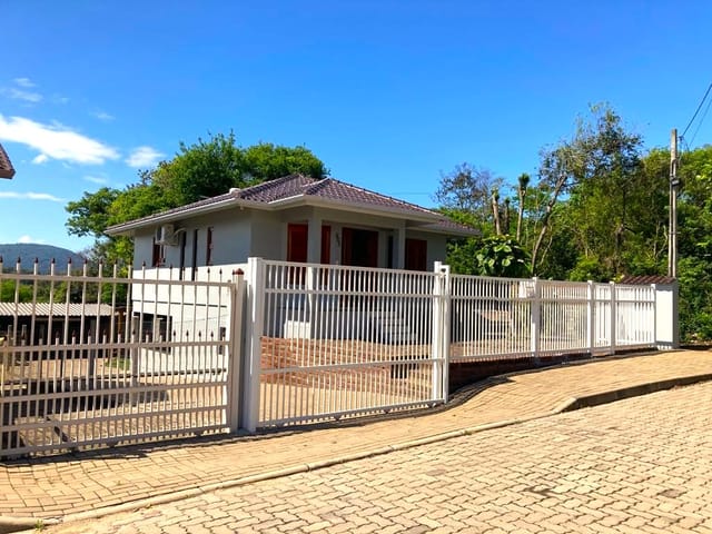 Foto do Casa - Casa com 2 dormitórios, garagem para 2 veículos, cercada e murada, à venda no Bairro Aimoré na cidade de Arroio do Meio/RS | Executivo Imóveis