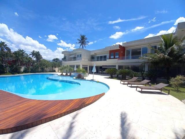 Foto do Casa - Luxuosa casa à venda e para locação, Frente Mar com 9 Suítes, no Condomínio Costa Verde Tabatinga, Caraguatatuba, SP | Israel Imoveis